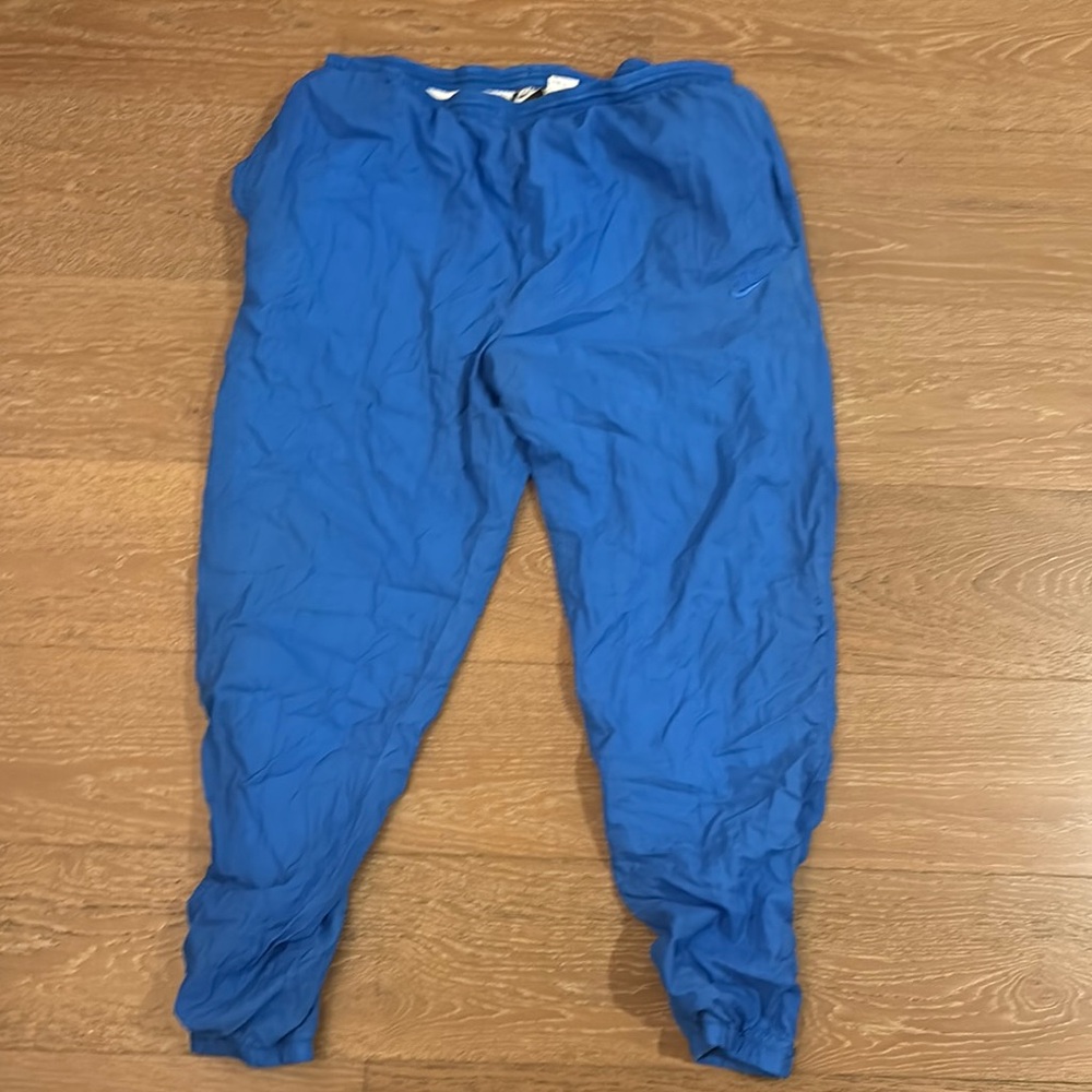 Blue Nike parachute pants